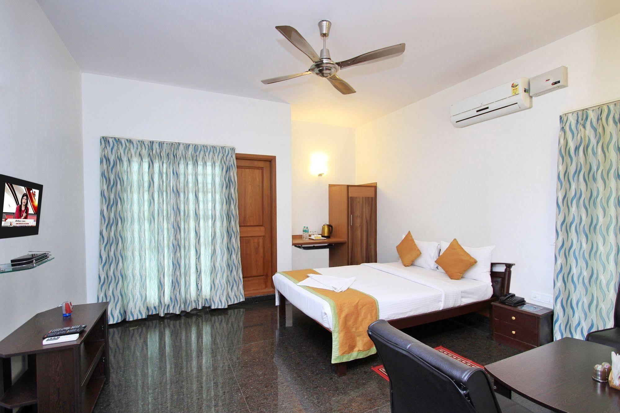Orange Suites Airport Transit Stay Yelahanka Екстериор снимка