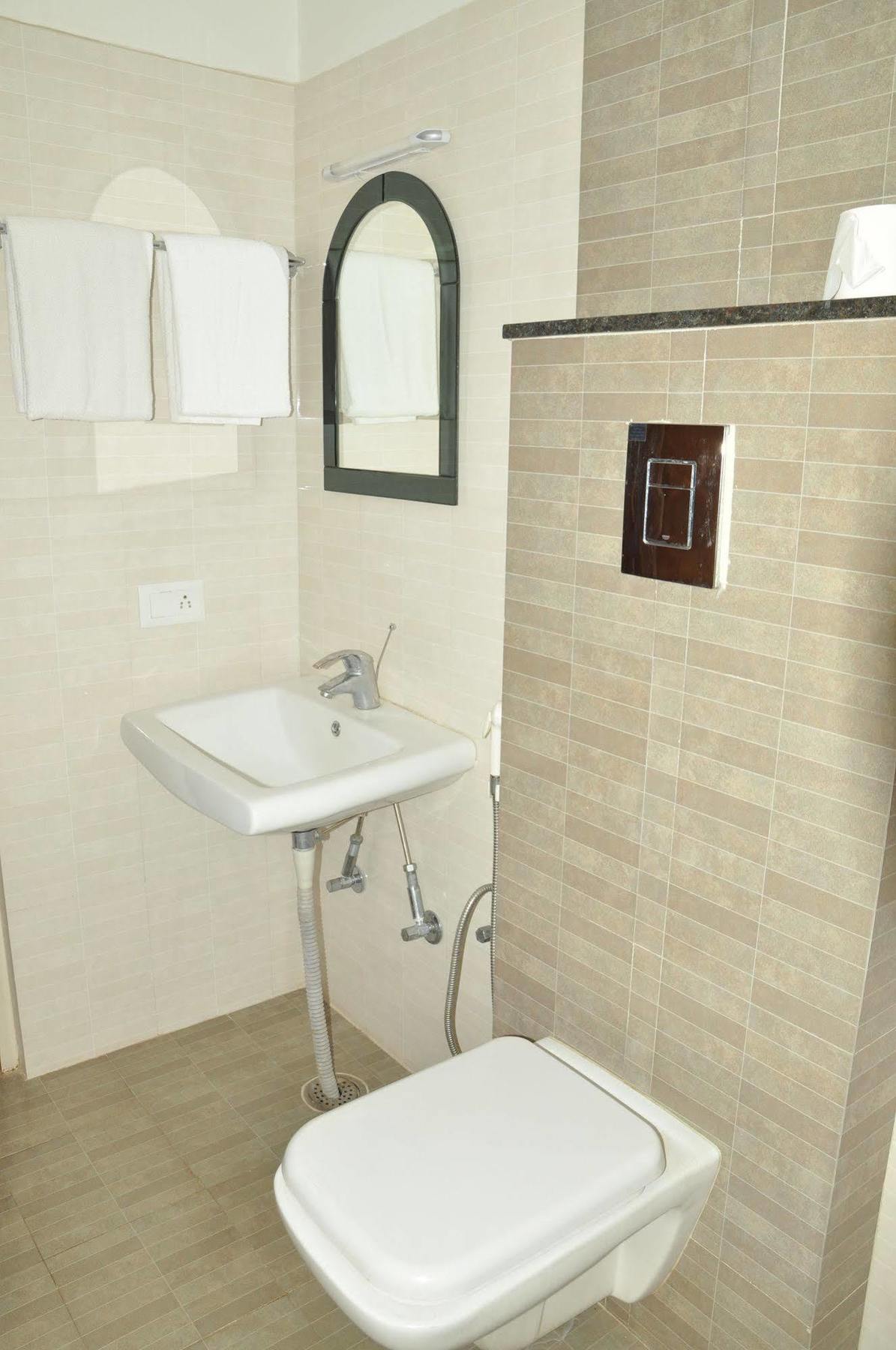 Orange Suites Airport Transit Stay Yelahanka Екстериор снимка